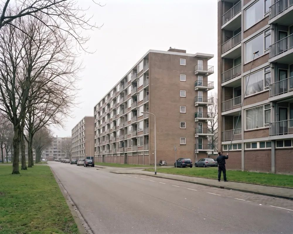 Window cleaner at work in Amsterdam Osdorp